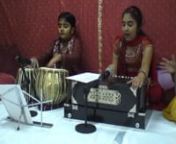 Mata ki Chowki with the blessings of almighty Maa Durga by youngest devotees 12Sanskrit, English, Punjabi and Hindi. Prachi plays Harmonium &amp; Violin and Surya Plays Tabla, Punjabi Dhool, Harmonium and recently started learning Saxophone. Devotional nnCD&#39;s NARAYAN &amp; EK OMKAR nwww.soundclick.com/prachisurya NRI Talent in NJ USA nnhttp://hindtoday.com/videos/ViewVideo... nnhttp://www.flickr.com/photos/28501071...