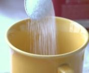 A yellow cup friendly accepts pouring sugar into it. Somebody is boiling hot water and preparing himself a coffee drink.nnSlow motion video is based on a variable frame rate set to 50 fps while shooting in 25 fps mode.nnnDOWNLOAD LINK: http://unripecontent.com/2014/05/09/pouring-sugar-in-a-cup-for-a-coffee-drink-slow-motion-free-hd-video-stock-footage/nnDimensions: 1920 x 1080nVideo codec: H.264nColor profile: HD (1-1-1)nDuration: 00:05nFPS: 25nData rate: 17.80 Mbit/s