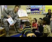 Major Scott Drummond of the 122nd Fighter Wing Air National Guard reads to Nebraska Elementary School preschool students in Blanca Rosa&#39;s class as part of Read Across America events.