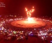 Aerial footage of ~70,000 people watching The Burn at Burning Man 2014 at around 9:30pm on Saturday, August 30, 2014. Shot with DJI Phantom 2, GoPro 3+ Black, and DJI Lightbridge wireless HD transmission. Black Rock City, Nevada.nnA lot of my flights were live-streamed to the Burning Man webcast at http://ustream.tv/burningman. DJI&#39;s Lightbridge wireless HD system did a great job in getting 720p footage from the Phantom 2 to the streaming container in Center Camp (behind Media Mecca), where it w