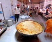 In New Delhi&#39;s Sikh temple, Gurdwara Bangla Sahib, volunteers labour over giant pots and pans in stifling conditions to feed the tens of thousands of visitors who visit daily - for free! The philosophy behind this is simple: here everyone is treated as a god regardless of caste, religion or wealth. Filmed by Afterglow for Fairfax Media.