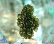 Item Code: IM022nMetric Dimensions: 36 x 26 x 14 mmnImperial Dimensions: 1 3/8 x 1 x 5/8 inchesnWeight: 50.5 Carats (10.10 grams)nnThis powerful Investor Grade Moldavite specimen weighs 10+ grams and has amazing texture and unusual shape. The color is widely varied in this singular piece, going from forest to bright green.nnMoldavite is considered by some to be the alchemical
