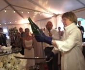 This is the coolest way to open a bottle of champagne at a wedding! nnJan Kish la petite fleur http://www.jankish.comnnTRUE Video http://truevideo.biz is a service of TRUE Studios http://truestudios.biz - a creative video production studio.