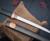 A quick clip of the final assembly of the Tsukimi Tanto. All parts of traditionally constructed tanto and koshirae fit together tightly and the assembly is locked together with a single bamboo peg. Each part fits only one way, even the bamboo peg has a specific alignment for maximum strength.nnView the finished work: http://islandblacksmith.ca/2014/09/tsukimi-tanto/nSee the process of making this piece: http://islandblacksmith.ca/process/making-the-tsukimi-tanto/nnThe bright orange moon of late