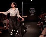 ‘Dangal’ star Sanya Malhotra grooves on the ramp at Lakme Fashion Week 2017. The actress shook a leg while she swayed on the ramp for The Meraki Project. Dangal girl Sanya waltzed in her black colour skirt on the first day of the Lakme Fashion Week. She wore a slate grey shirt tied at her midriff with some pretty doodle patchwork. She paired this uber-chic shirt with a black flowy full-length skirt with flower appliques. She made turned her skirt playfully as she waved with it. She lit up th