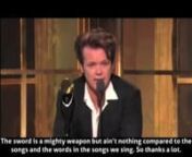 ‘Don’t let this club membership change you, John’, says Joel [3:35] at Mellencamp&#39;s 2008 induction into the Rock &amp; Roll Hall of Fame. ‘We need you to be pissed off and restless... People are scared and angry... They need a voice like yours to echo the discontent out there in the heartland... Someone’s got to tell them “don’t take any shit” and, John, you do that very well.’ John says ‘The sword is a mighty weapon but it ain’t nothing compared to the songs and the words