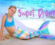 Fin Fun’s March Tail of the Month - Sweet Dreams - shimmers with scores of stars and shell-shaped scales! nnDo you dream of unicorns AND mermaids?Stop dreaming and start swimming in Fin Fun’s Sweet Dreams Limited Edition Mermaid Tail.This unicorn-inspired mermaid tail features a dreamy color palette of pastel rainbow hues, sure to awaken the magic within you!Bursting with pink, blue, green, yellow, and purple scales scattered with stars, this premium Limited Edition mermaid tail is per
