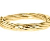https://www.ross-simons.com/946603.htmlnnFrom Italy, this polished 18kt yellow gold over sterling silver 3/8 wide twisted bangle bracelet is a classic style for every occasion. Flaunt it solo for a luxe look or mix it in a chunky stack of favorites. Figure 8 safety. Hinged. 18kt yellow gold over sterling silver wide twisted bangle bracelet.