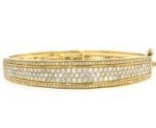 https://www.ross-simons.com/970271.htmlnnIndulge in the radiance of this diamond bangle bracelet. It features 3.00 ct. t.w. pave diamonds in polished 18kt yellow gold over sterling silver. Hinged. Figure 8 safety. Box clasp, diamond bangle bracelet.