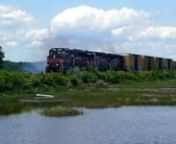 A westbound Pan Am Railways freight train at Winnocks Neck Road in Scarborough, Maine.