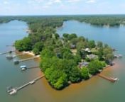 Waterfront luxury w/long range sunset views of main channel of Lake Norman! Located on highly desirable Isle of Pines Peninsula w/no HOA. Recently renovated w/ all the luxuries you would expect. Encompassing 4 BRs w/2 Primary Suites, 1 on main level w/ separate sunroom,1 on 2nd level w/Juliet balcony &amp; separate office. Huge bonus room currently used as 5th bedroom. Inspired by the love of entertaining, this home has it all inside &amp; out. True Chef&#39;s Kitchen w/ high-end appliances, leather