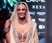 Sushmita Sen channels her inner Miss India as she slays at the Lakme Fashion Week 2018. The former Miss Universe had us all in awe of her beauty as she strutted down the ramp in the most elegant and graceful manner. Doused in shimmer, the actress gleamed in her ensemble by the brand Kotwara by Meera and Muzaffar Ali at Lakme Fashion Week Summer/Resort 2018, in Mumbai. The actress looked like a royal bride in a pearl-grey lehenga choli layered by diaphanous dual dupattas. She elegantly walked the