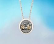 Free Wheeling Pendant - this design captures the joy of cycling and taking to the open road - allowing the gold wheels to follow your dreams!