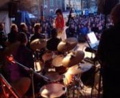 In The Ghetto. Performance on the main stage of this 2012 Elvis Rock &#39;n Roll festival. Live show with bigband, choir and combo. Written by Mac Davis and made famous by Elvis Presley who had a major comeback hit with the song in 1969. The original version of