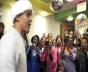 Former President Barack Obama swapped his suit and tie for a Santa hat when he visited children at a leading pediatric care facility in Washington D.C.
