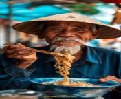 Prompt Midjourney : a vietnamese guy eat noodle --ar 9:16 --v 6.0
