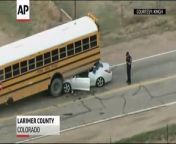 The Colorado State Patrol says three children and a school bus driver have been injured after a car ran under the back of a school bus north of Fort Collins.