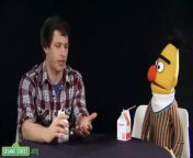 Sesame Street&#39;s Bert continues his interview with comedian and Saturday Night Live cast member, Andy Samberg, this time tackling the important subjects of bottle caps, paper clips and pigeons.