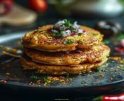 Prompt Midjourney : almond flour pancakes cooked with chili powder, tuermeric, and chopped onions, shot with Nikon D850 and Nikon AF-S NIKKOR 14-24mm f/2.8G ED lens, bright light, bright kitchen background, style: food photography --v 6.0