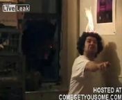 Crazy and apparently drunk guy sets his own hair on fire,not once,but twice.
