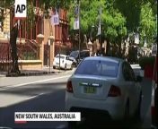 Police officers in New South Wales, Australia rushed a car breaking windows and spraying fire extinguishers after a man inside threatened to set himself on fire outside the Parliament building.