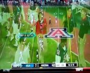 College kid named Jacen Lankow interrupted last night&#39;s UCLA-Arizona football game by running onto the field as a referee and then breaking out in a Speedo. As the co-ed was being cuffed, for whatever reason, both teams started beating the hell out of each other.