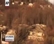 Aerial video shows homes and trees damaged in wildfires in Gatlinburg, Tennessee. Officials say crews discovered the remains of more people as they searched through rubble, bringing the death toll to 11.