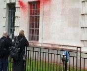 Youth Demand paint the Ministry of Defence in protest of the government&#39;s decision to continue exporting arms to Israel.