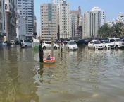 Sharjah residents use inflatables to wade through the water from water home birth