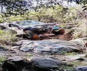 Pajero srucked on rock while offroading