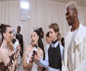 As Lil Nas X and Troye Sivan talk to Emma Chamberlain at the 2024 Met Gala, Charli XCX crashes the party and trio talk about starting a band together. What will they call it? Well, that may not be safe for air!