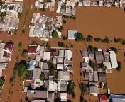 Entire neighborhoods remain underwater after severe flooding in southern Brazil, which has killed at least 126 people and left another 756 injured. In the devastated town of Eldorado do Sul, boats pass through the streets distributing food to people trapped in their homes by the murky water and fears over looting. Experts have linked days of heavy rain to climate change and the impact of the El Nino weather phenomenon.